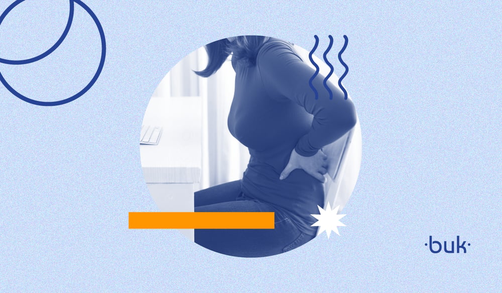 Ilustración que muestra a una persona sentada con dolor de cintura en alusión a la ergonomía en el puesto de trabajo